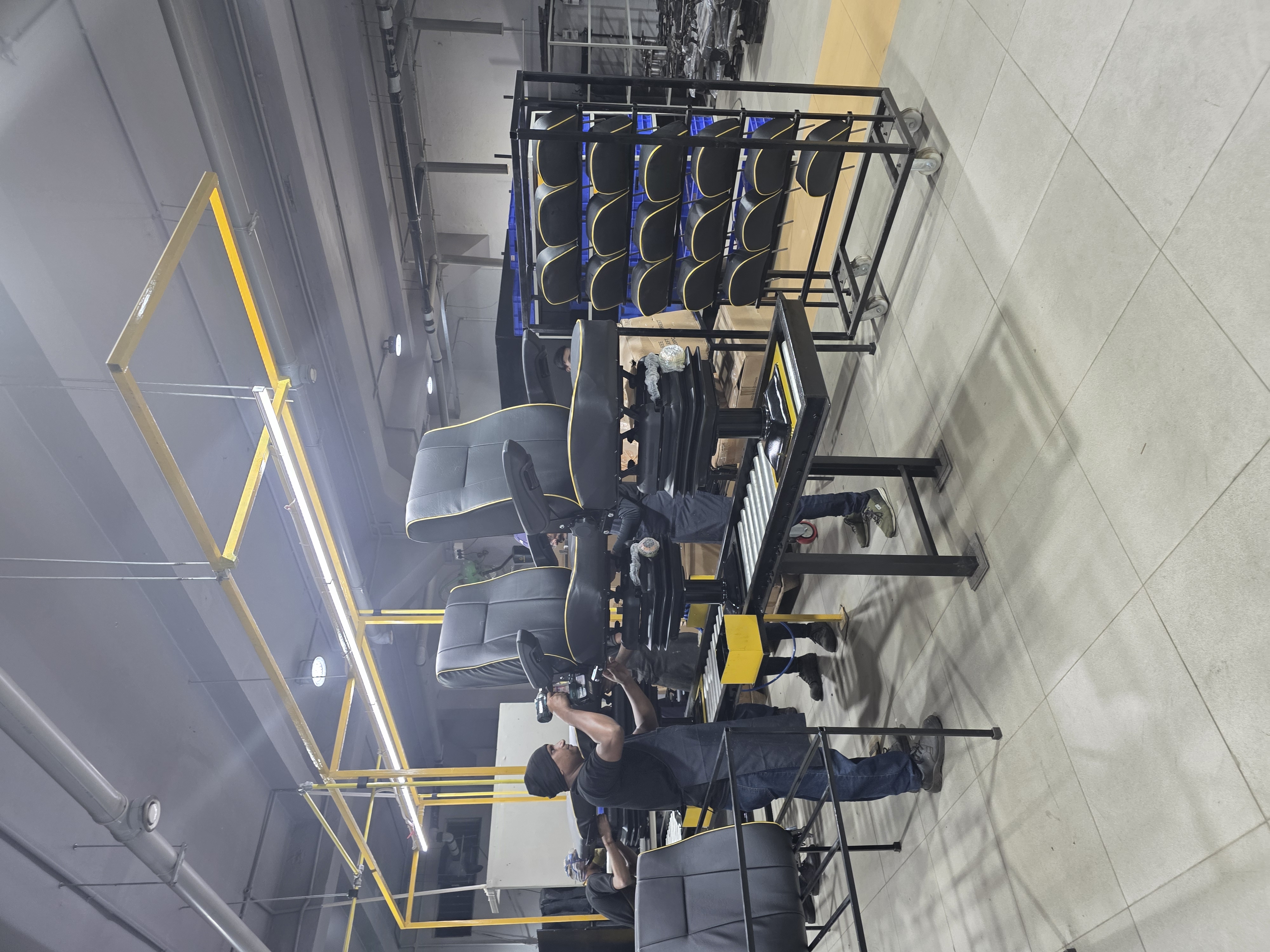 Ironthrone shop floor — assembly bay with TrackThrone seats in production
